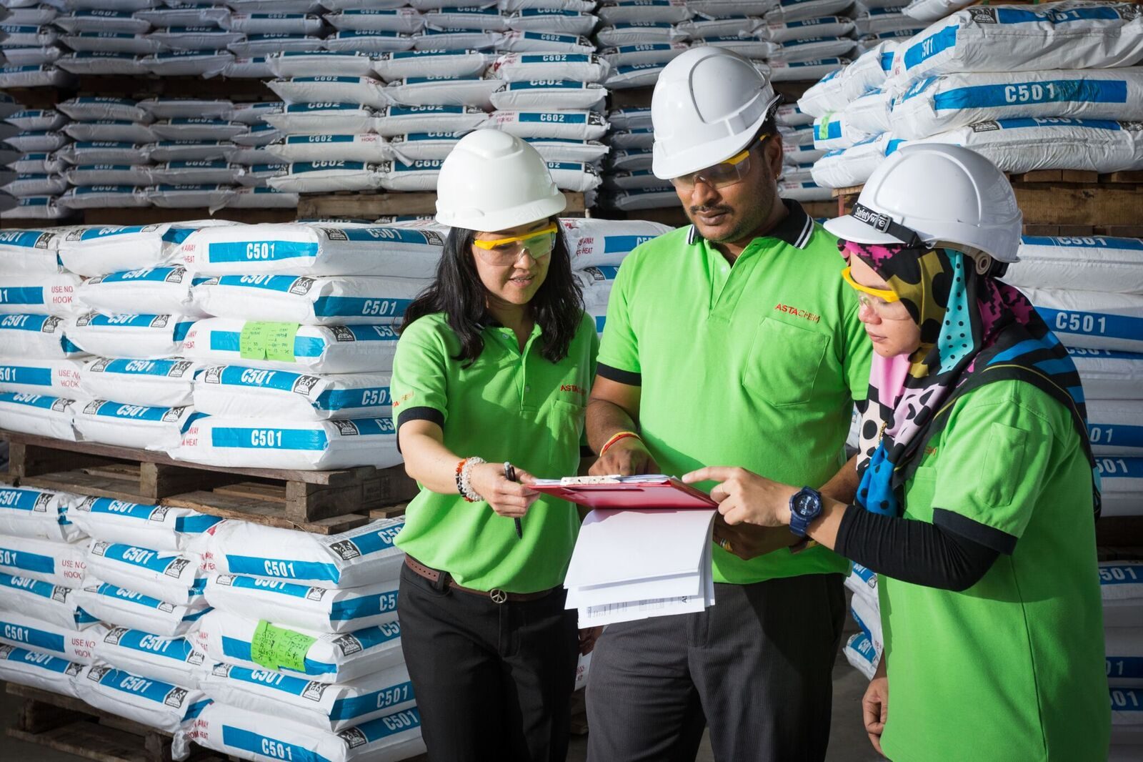 Quality team inspecting stock